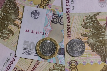 Рубль дешевеет из-за нестабильности на внешних рынках